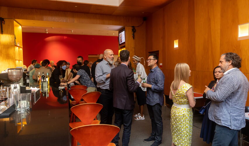 People gather in a lounge space