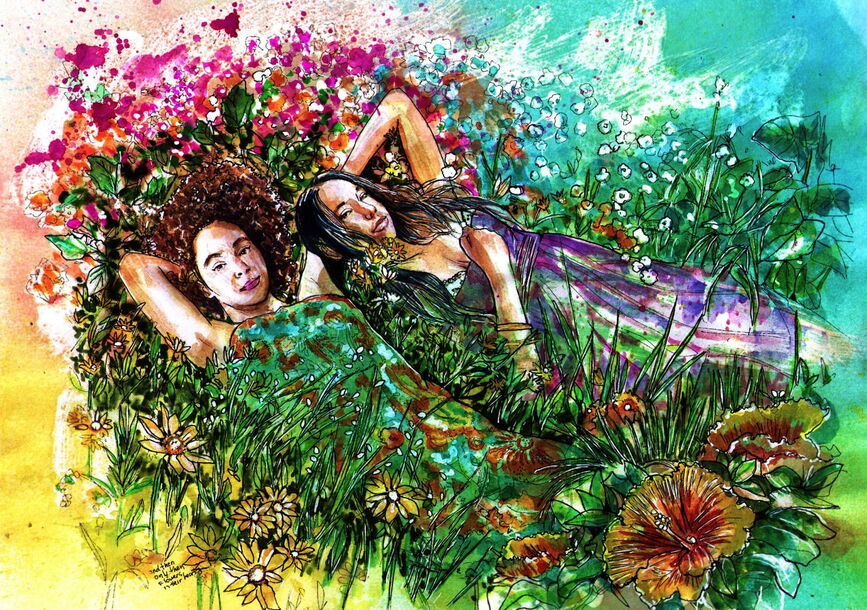 Two women resting on a bed of flowers.