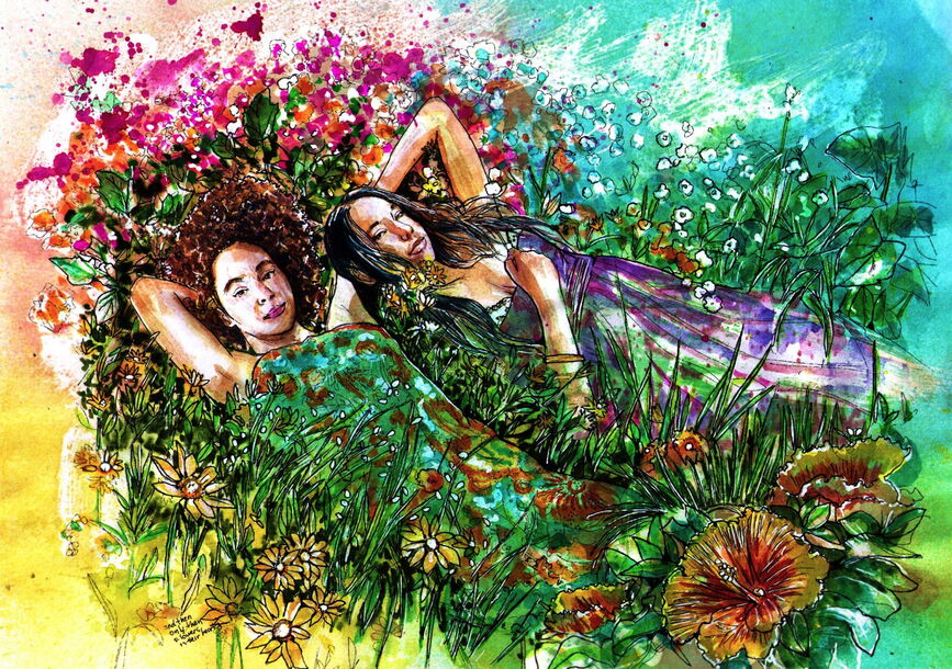 Two women resting on a bed of flowers.