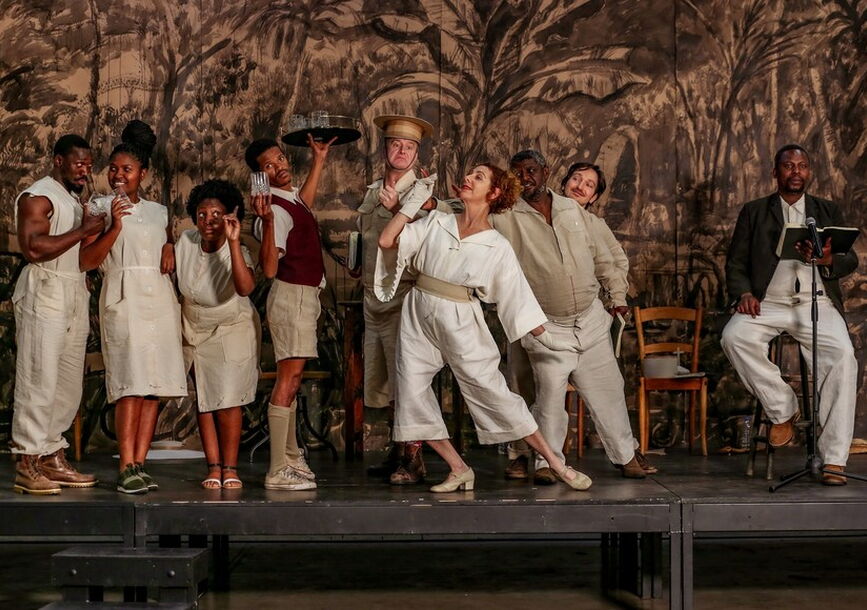 Eight performers on stage in William Kentridge: Houseboy.