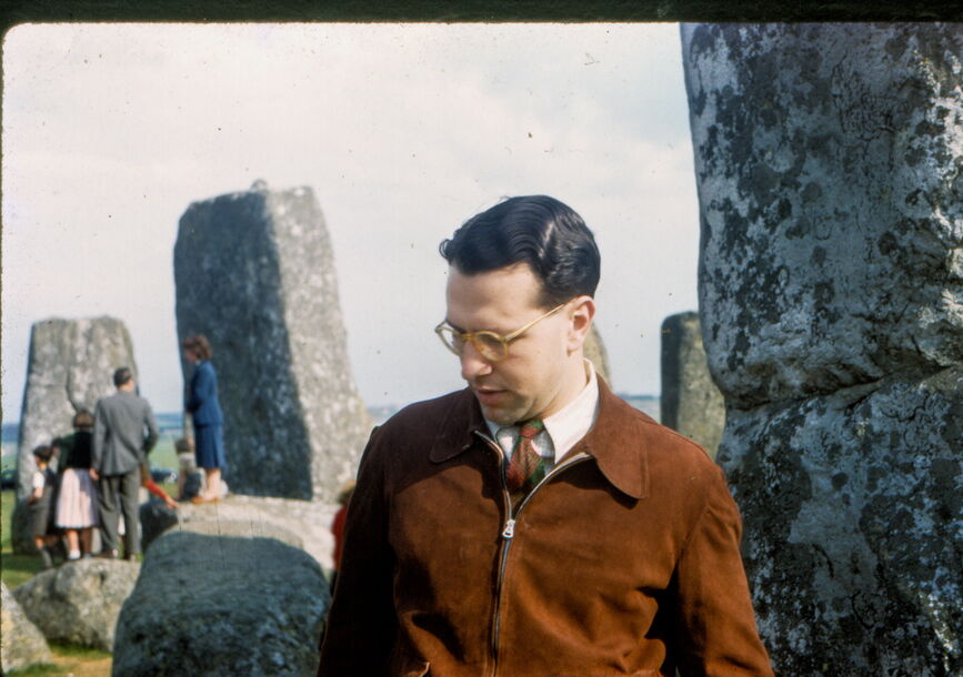 man in front of rocks