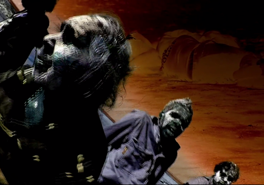 still shot of a film of several zombie-looking figures