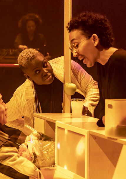 Autumn looks at two people talking.