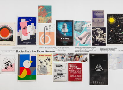 photo graphic design posters on a wall